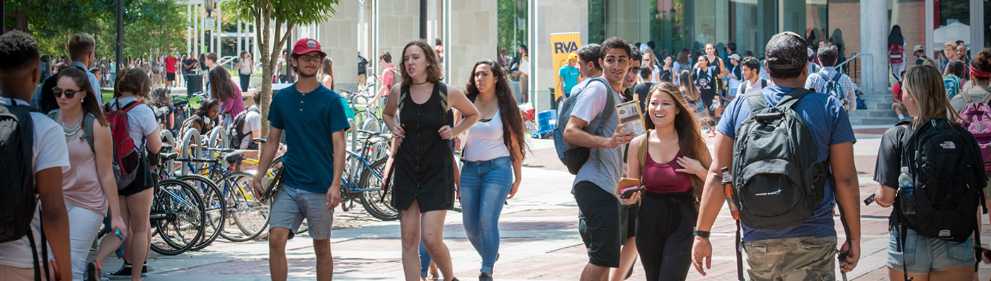 students walking across VCU campus